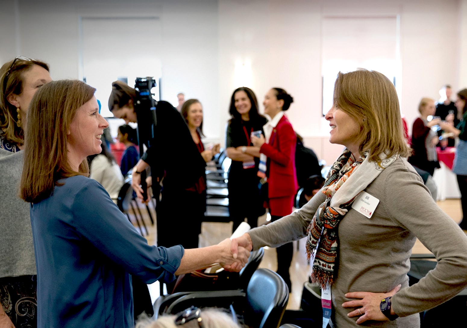 Women shaking hands