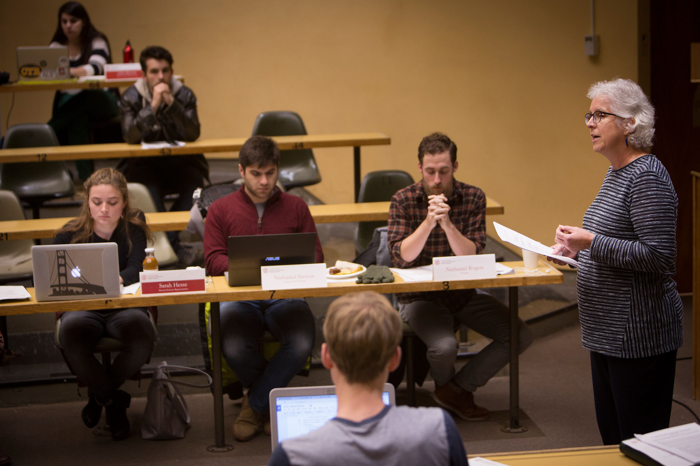 Dean Barbara A. Knuth addressing room full of students