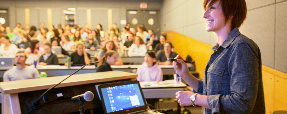 Teaching assistant in front of class