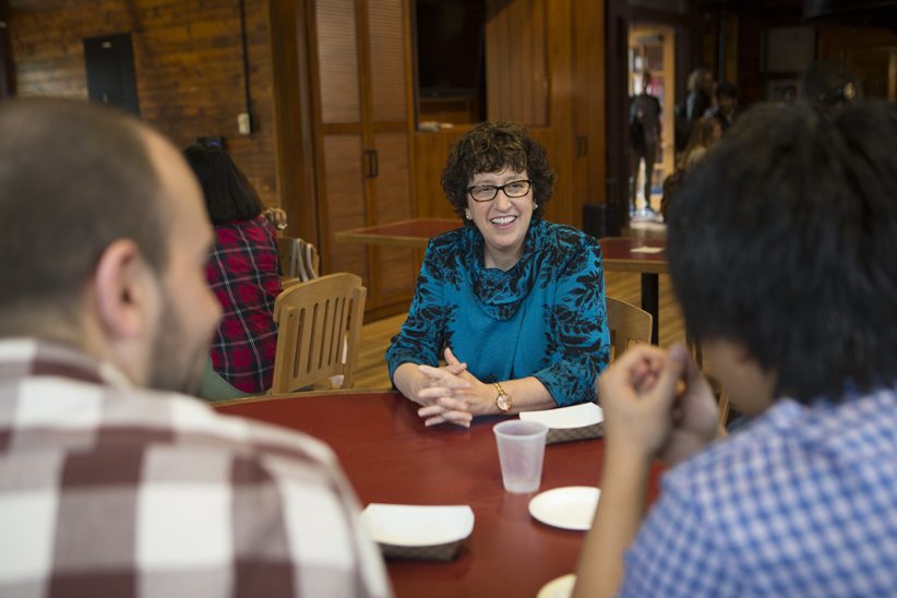 President Martha Pollack and grad students