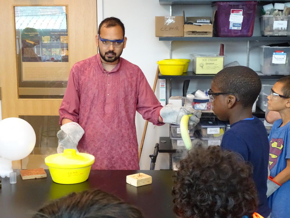 Madhur Srivastava teaching science to K-12 school students