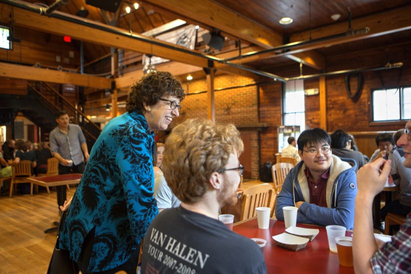 President Martha Pollack speaking with students