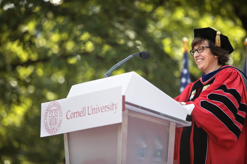 President Martha Pollack behind a podium