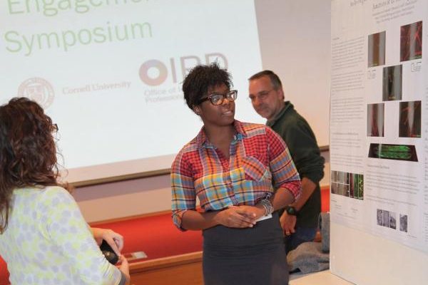Student presenting a poster
