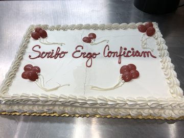 Cake with inscription "Scribo Ergo Conficiam" ("I write therefore I finish")