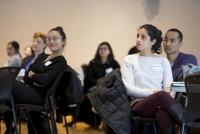 Students listen to a presenter at Pathways to Success Symposium