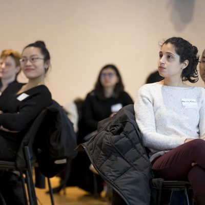Students listen to a presenter at Pathways to Success Symposium