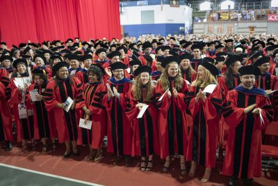 Doctoral candidates at Ph.D. Hooding Ceremony