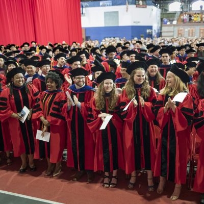 Doctoral candidates at Ph.D. Hooding Ceremony