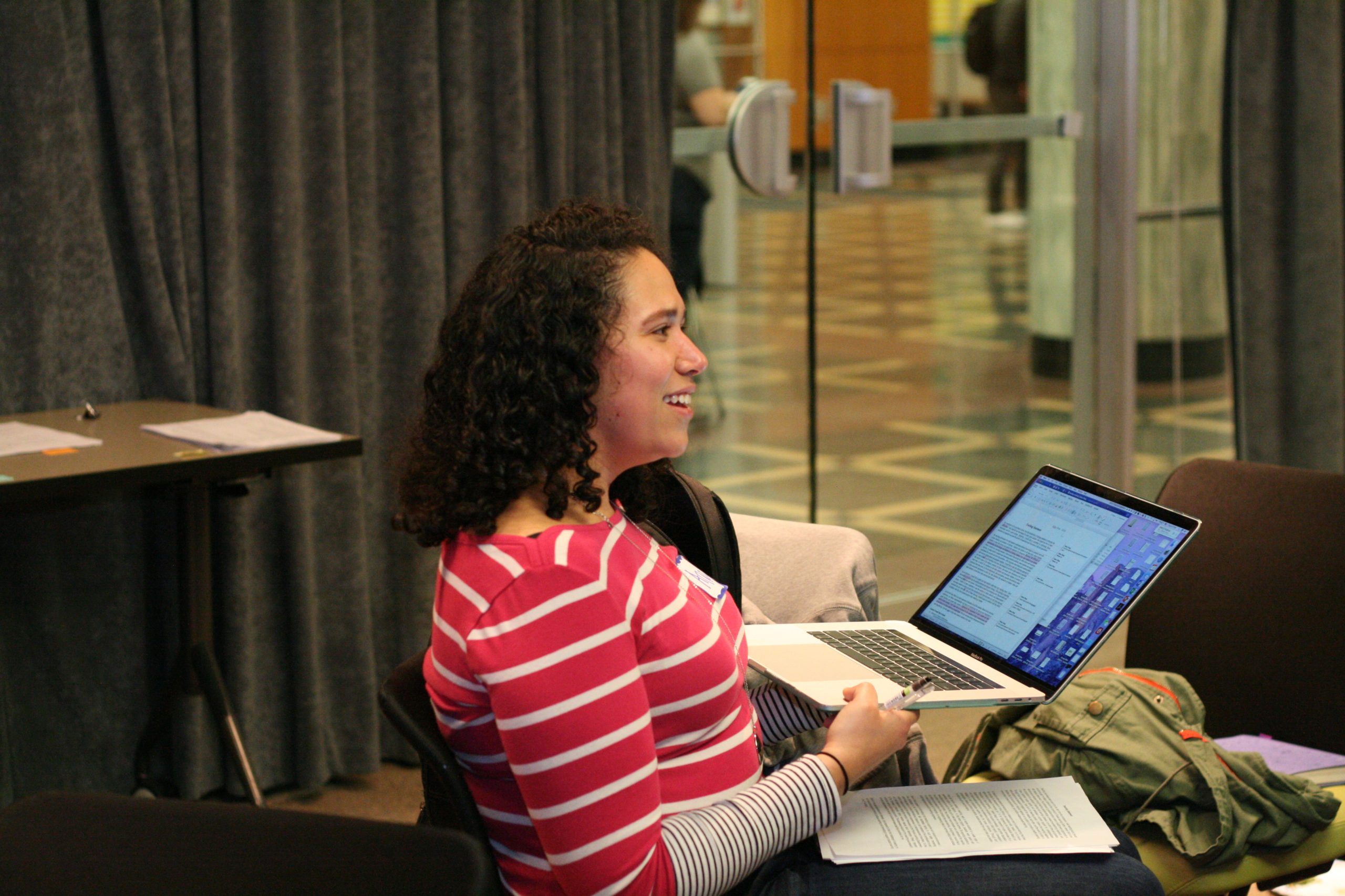 Woman with a laptop in conference room