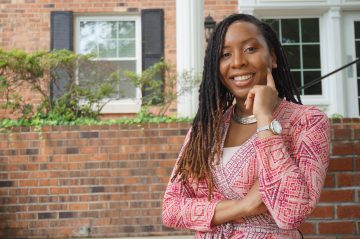 Malika Grayson outdoors in professional attire