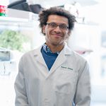 Aaron Joiner wearing a lab coat