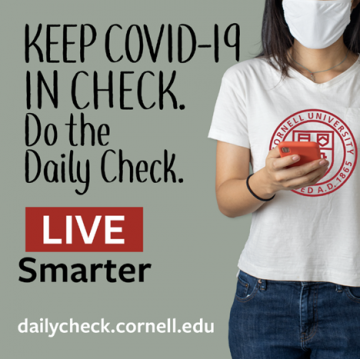 Person in mask staring at phone with text, "Keep COVID-19 in check. Do the Daily Check. Live Smarter. Dailycheck.cornell.edu"