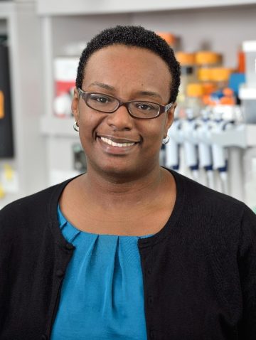 Beronda Montgomery smiling in a lab setting