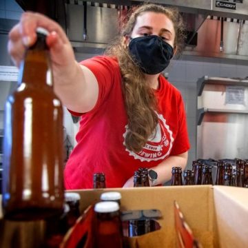 Margaux Mora prepares another beer at the Food Product Innovation Lab in Stocking Hall