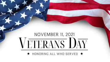 American flag with text, "November 11, 2021 Veterans Day Honoring All Who Served"