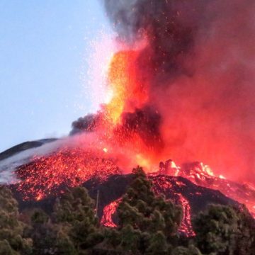 The active, fiery Cumbre Vieja volcano erupting.
