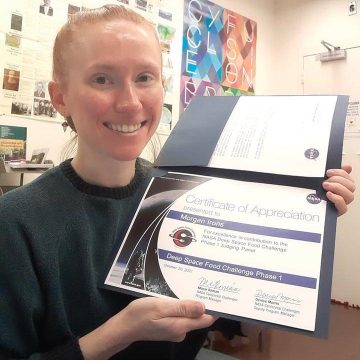 Morgan Irons holds a Certificate of Appreciation from NASA for contribution to the Deep Space Food Challenge Phase 1 Judging Panel