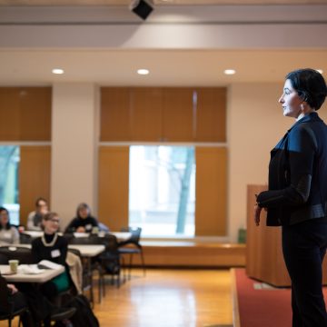 Eliza VanCort addresses graduate and professional students, postdocs, faculty, and staff attending a 2019 Pathways to Success Symposium.