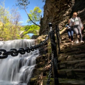 Students walk along a Cornell gorge