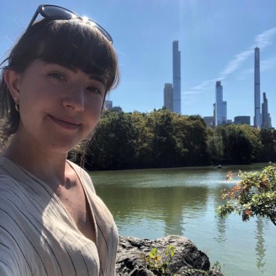 Rosanna Bellini with water and the New York City skyline in the background