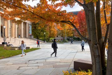 Students cross Bailey Plaza in fall