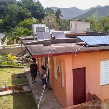 Rooftop solar photovoltaics power a home in Jayuya, Puerto Rico, located in the mountainous interior of the island.