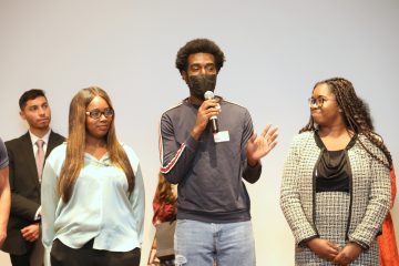 A student speaks during the 2022 Dean's Scholars Pinning Ceremony