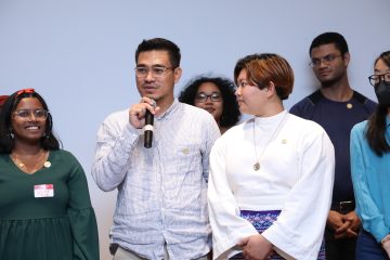 A student speaks during the 2022 Dean's Scholars Pinning Ceremony