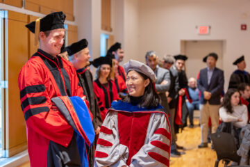 Doctoral candidate Trevor Franklin and advisor Rong Yang at the December '22 Ph.D. Hooding Reception