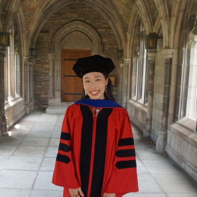 Yun Ha Hur, Ph.D. '21, in graduation regalia