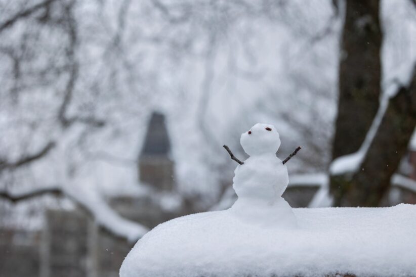 Miniature snowman near on Feeney Way near Lincoln Hall.