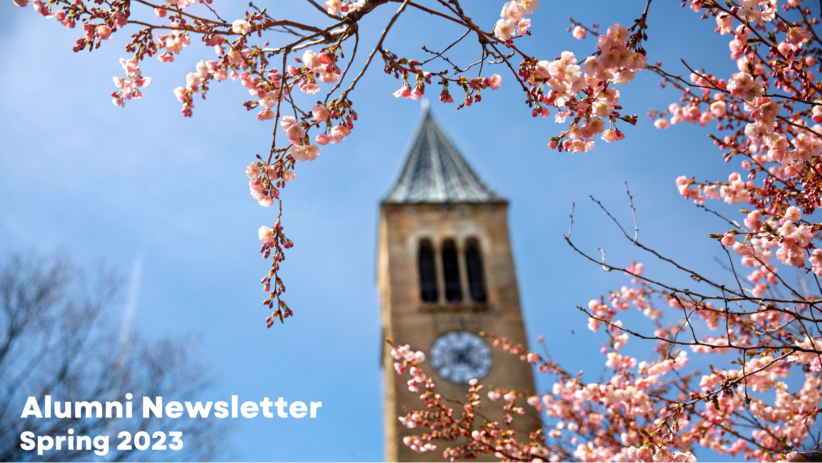 Spring blossoms surround McGraw Tower. Text reading, "Alumni Newsletter Spring 2023."