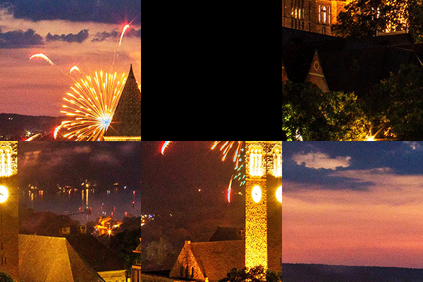 Big Red Sliding puzzle of fireworks behind McGraw Tower