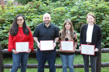 Four of the Postdoc Achievement Award recipients at the award reception