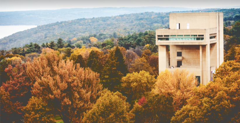 The Johnson Museum surrounded by trees in fall