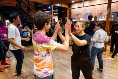 Students attend a swing dance event at the Big Red Barn Graduate and Professional Student Center