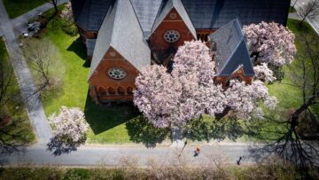 Aerial view of Sage Chapel with spring blossoms