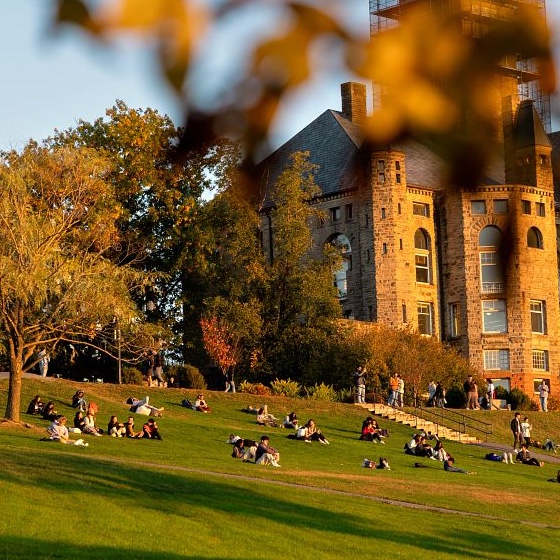 Students enjoy evening sunshine on Libe Slope
