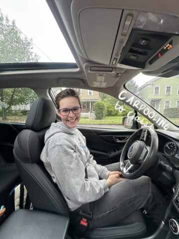 Jordan Deskins' friend, Anika, sits behind her car's steering wheel