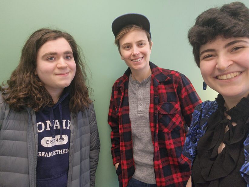 Rikki Laser takes a selfie with a collaborator and an undergraduate