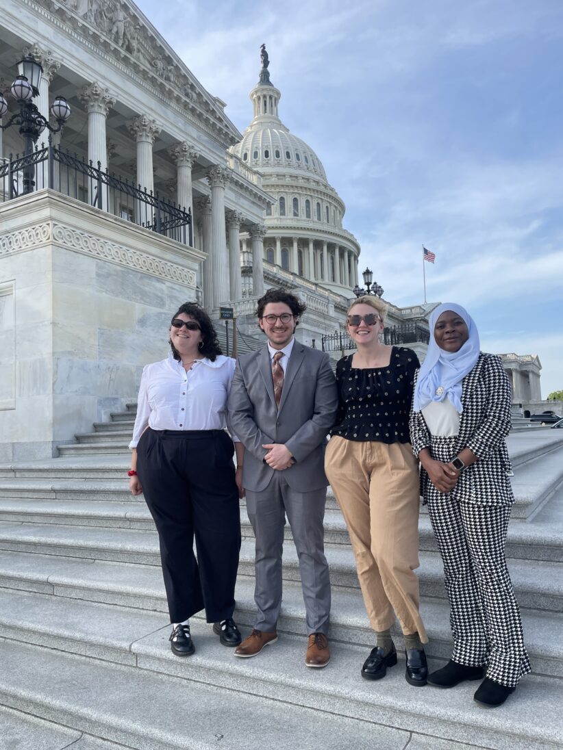 AAAS CASE participants stand on steps in front of the Capitol Building