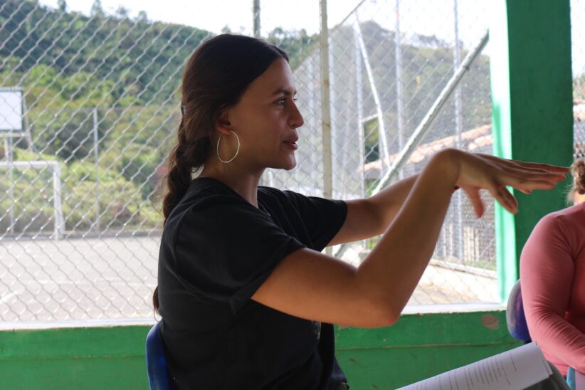 Elizabeth Gallego speaks, gesturing with her hands