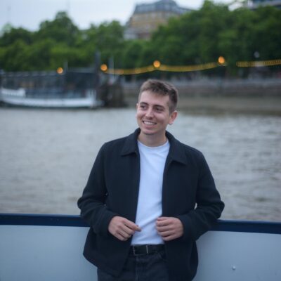 Dani Vilardell stands with a river behind him